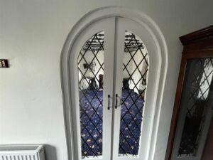 Arch doors to dining area